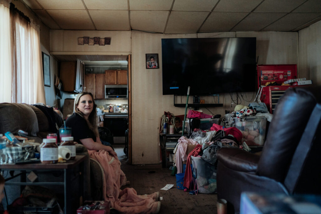 Ashley Rutherford, of Berwind, W.Va., and her four children have been living out of plastic totes since February when a devastating flood swept through McDowell County. (Sydnei Tatum for West Virginia Watch)