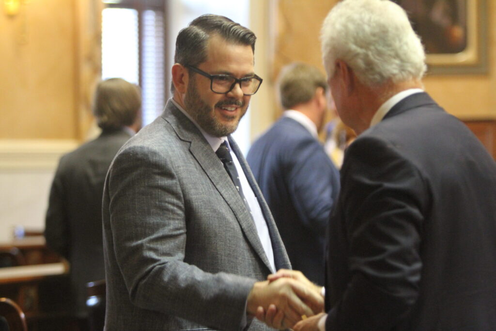 Sen. Jeff Zell, R-Sumter, shakes hands with Sen. Larry Grooms, R-Bonneau, during the Senate’s organizational session on Wednesday, Dec. 4, 2024, when all freshmen senators were sworn in to office. (File photo by Mary Ann Chastain/Special to the SC Daily Gazette)