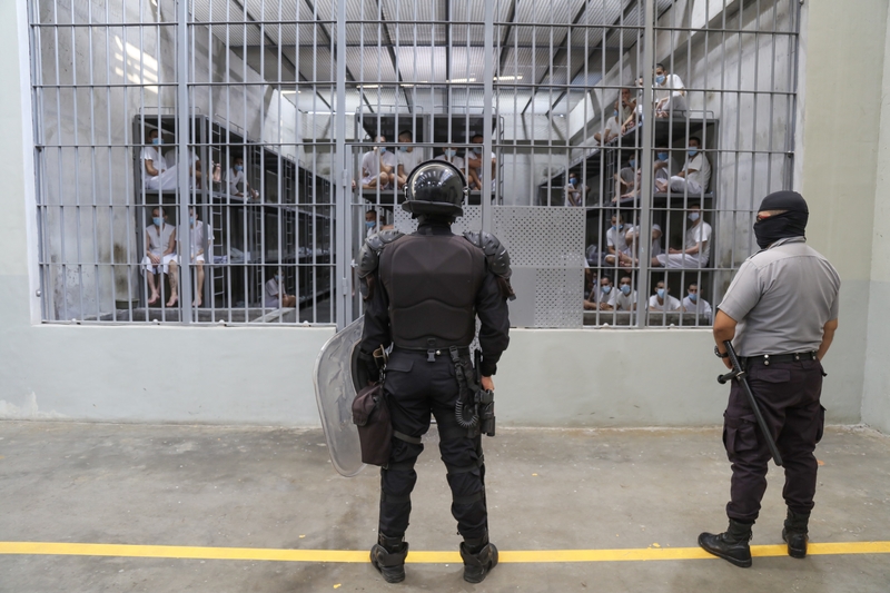 Prison officers stand guard at a cell block at maximum security penitentiary CECOT on April 4, 2025 in Tecoluca, San Vicente, El Salvador. (Photo by Alex Peña/Getty Images)